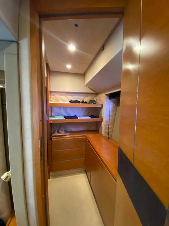 a hallway with a door and a mirror aboard DREN Yacht for Sale