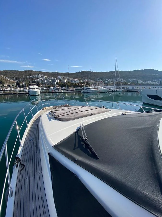 a boat in a harbor aboard DREN Yacht for Sale