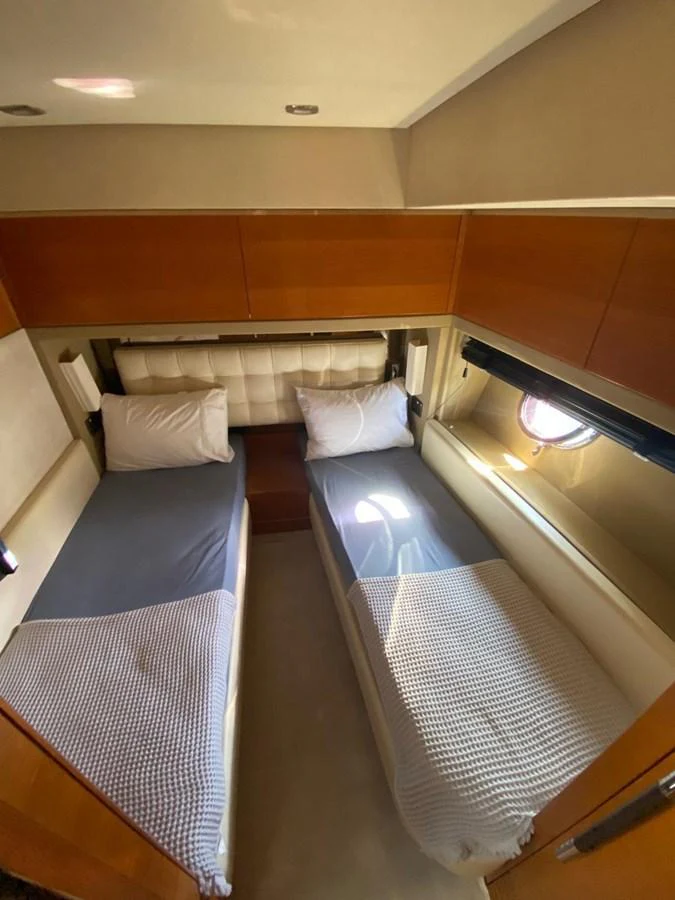 a room with bunk beds aboard DREN Yacht for Sale