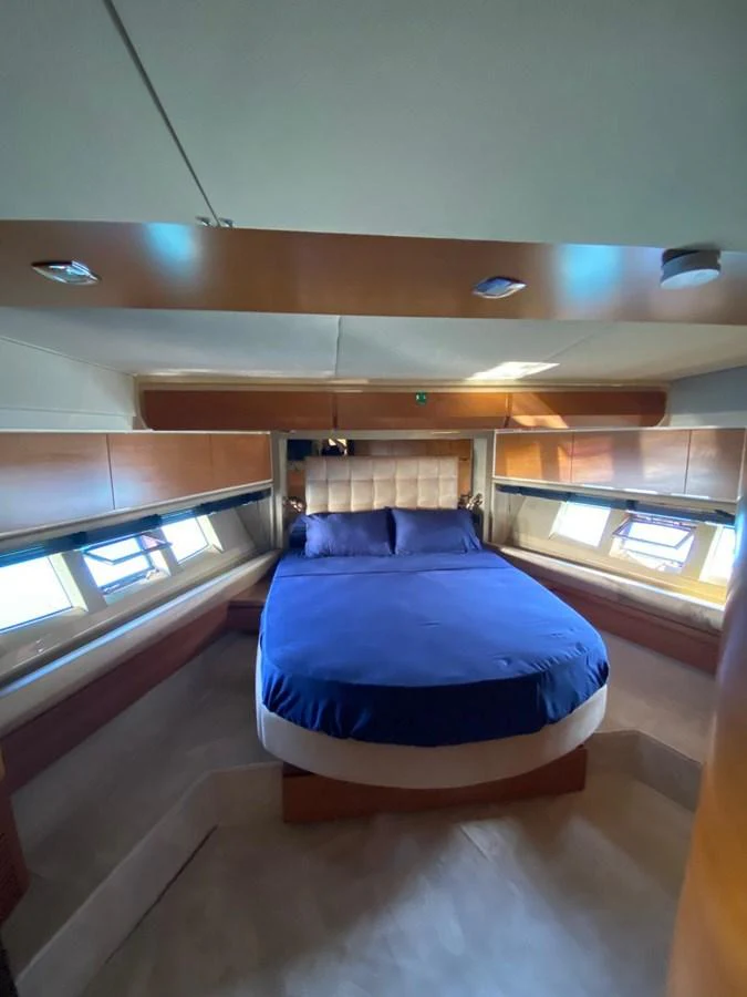 a bed in a room aboard DREN Yacht for Sale