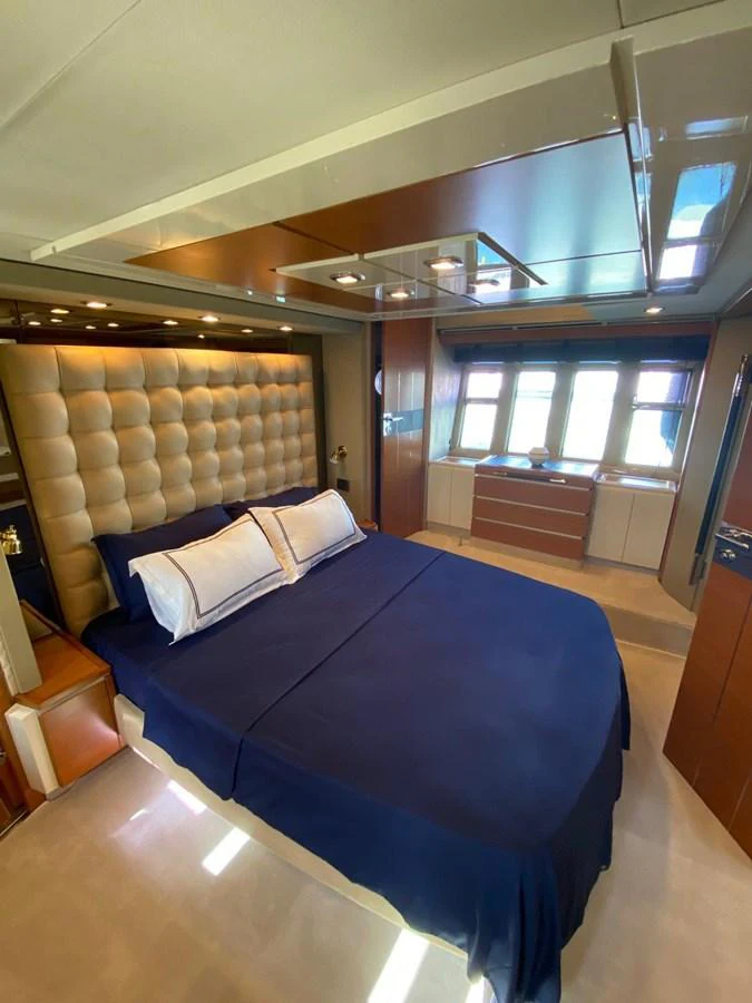a bed in a room aboard DREN Yacht for Sale