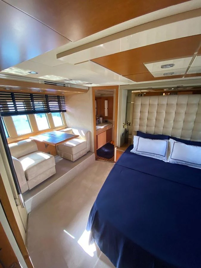 a room with a bed and a couch aboard DREN Yacht for Sale