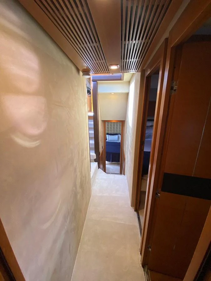 a hallway with a wood ceiling aboard DREN Yacht for Sale