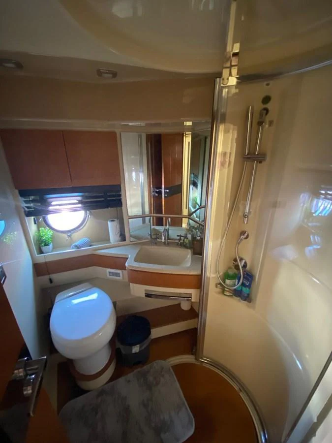 a bathroom with a tub sink and toilet aboard DREN Yacht for Sale