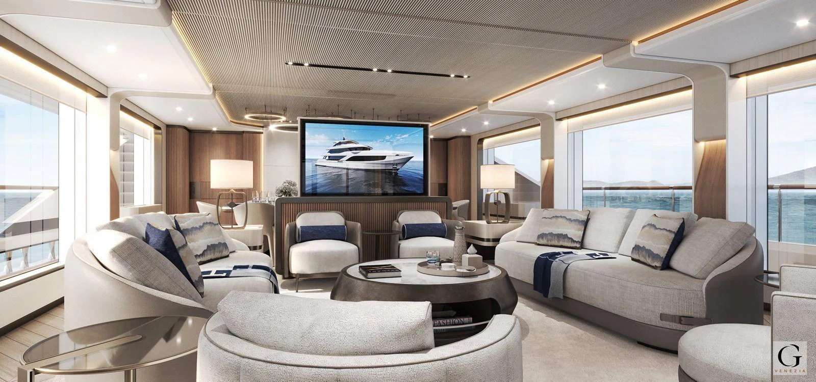 The salon features luxurious seating and a large screen for entertainment. aboard MAJESTY 145 Yacht for Sale