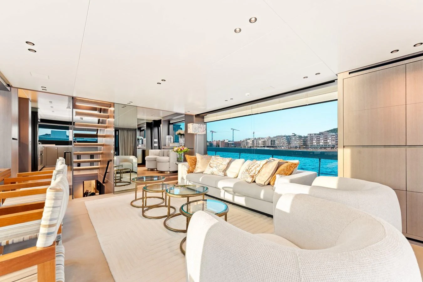 a living room with a large window aboard NORTH Yacht for Sale