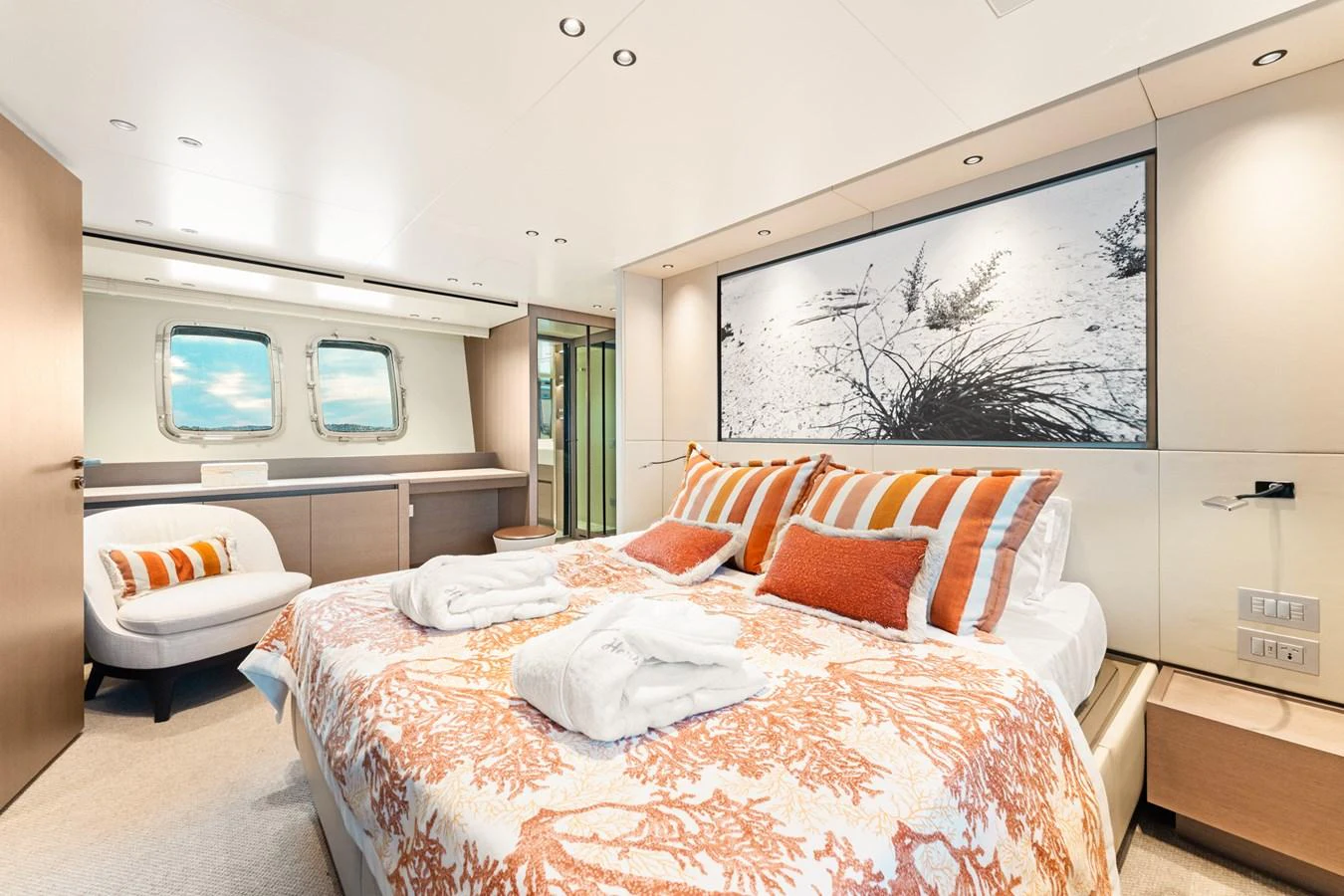 a bedroom with a bed and a couch aboard NORTH Yacht for Sale