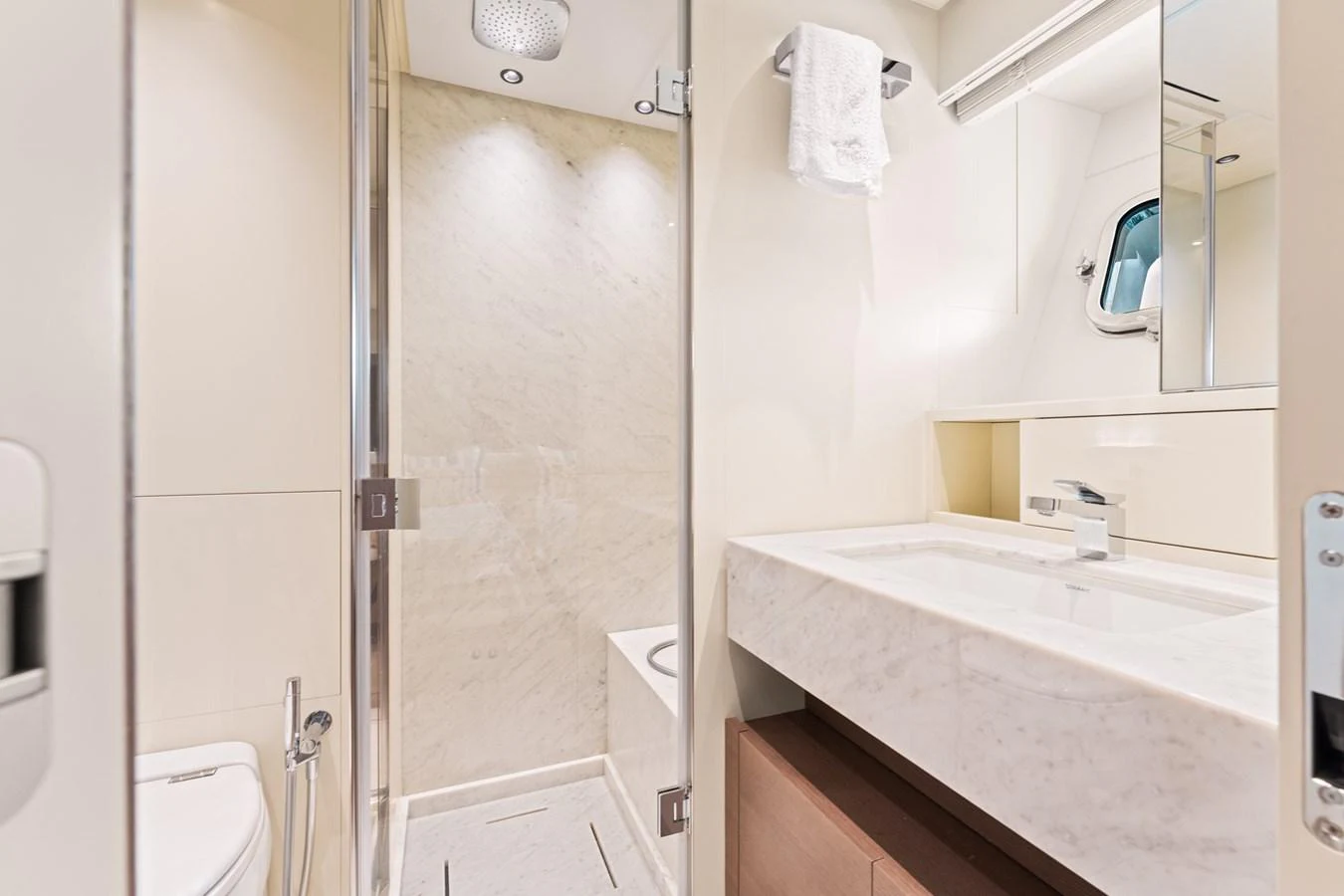 a bathroom with a glass shower aboard NORTH Yacht for Sale