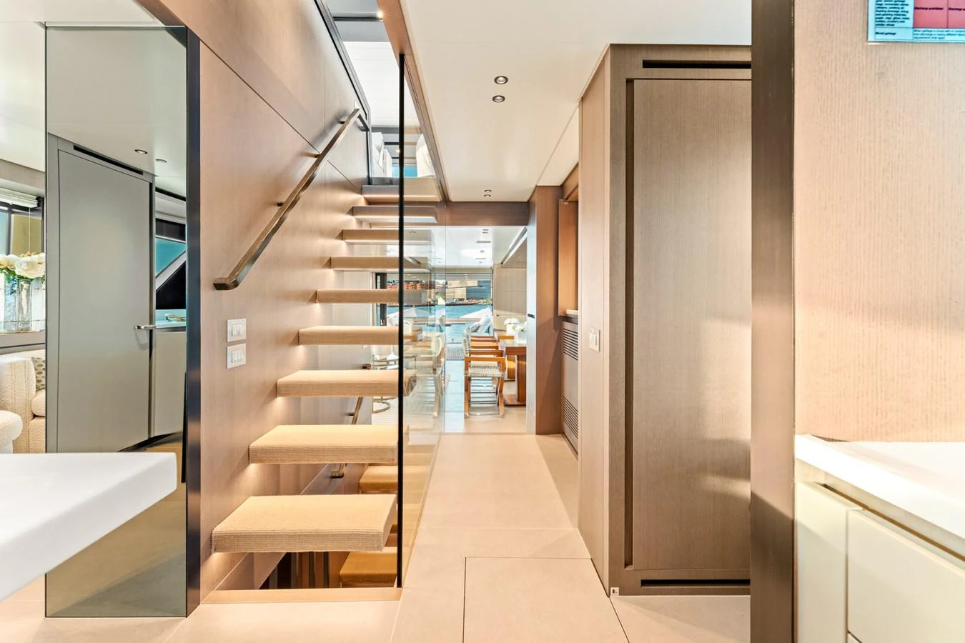 a hallway with a set of stairs aboard NORTH Yacht for Sale