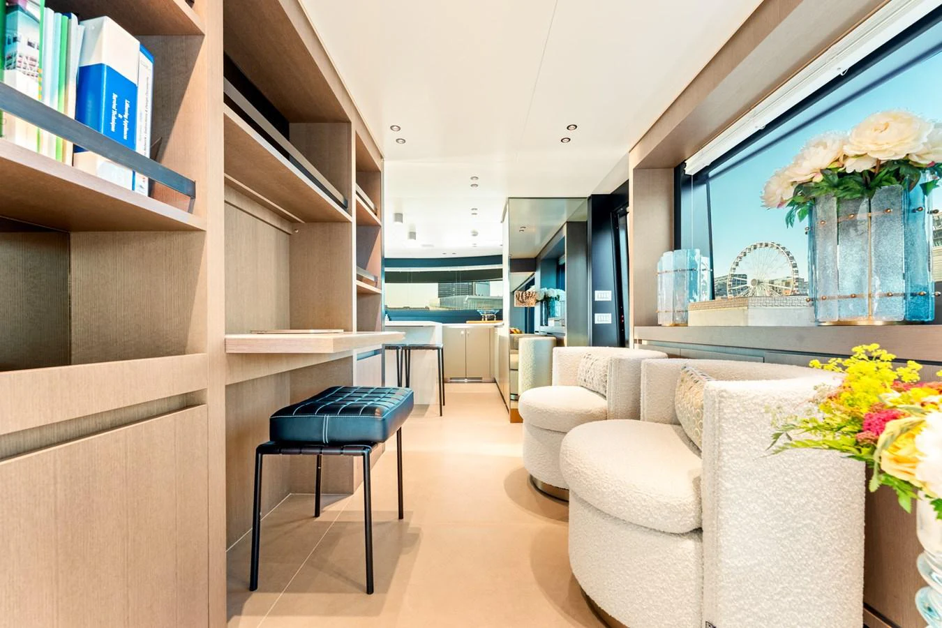 a room with a couch and a table and a chair aboard NORTH Yacht for Sale