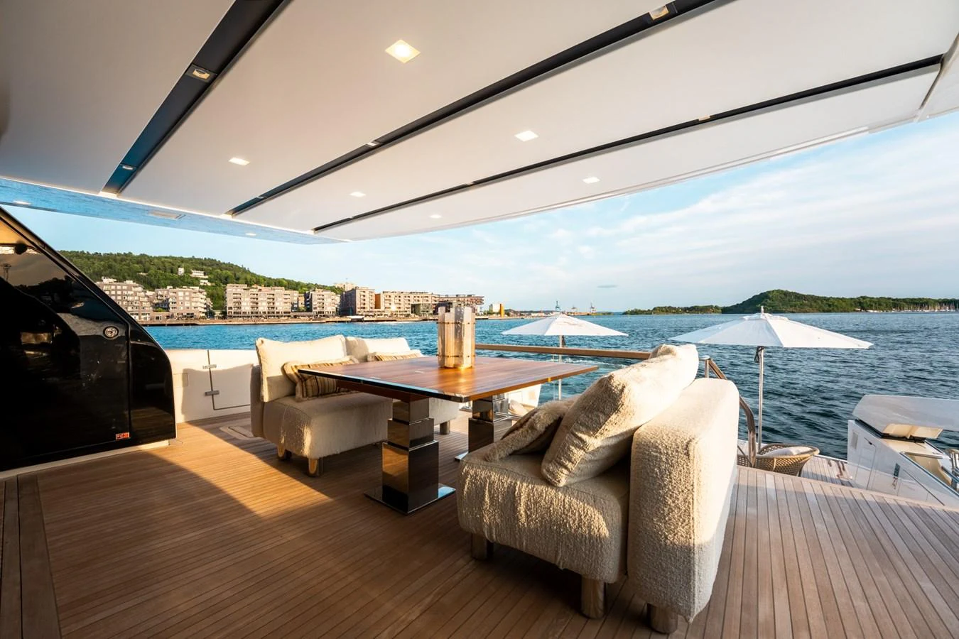 a room with a table and chairs aboard NORTH Yacht for Sale