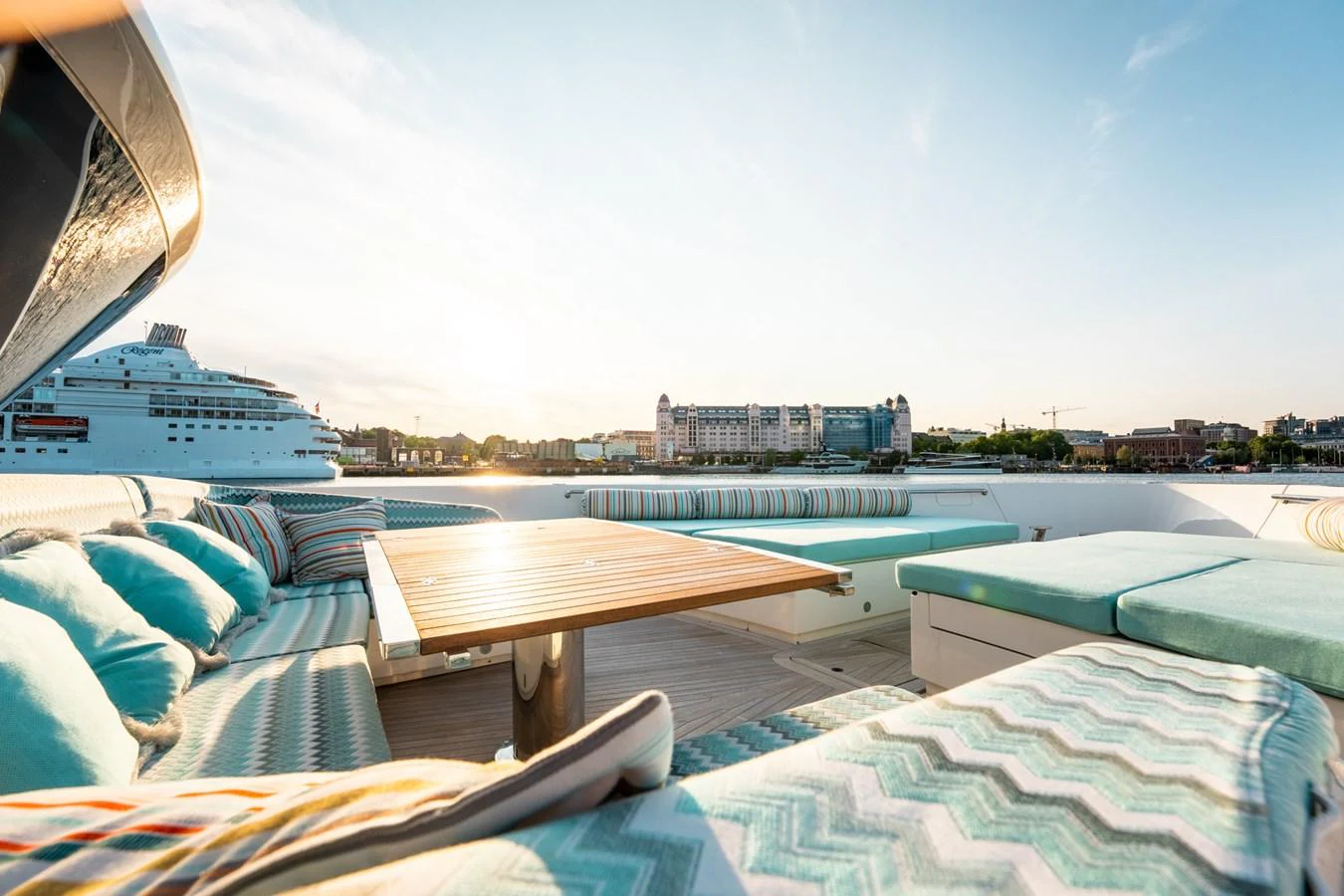 a pool with a deck and a view of a city aboard NORTH Yacht for Sale