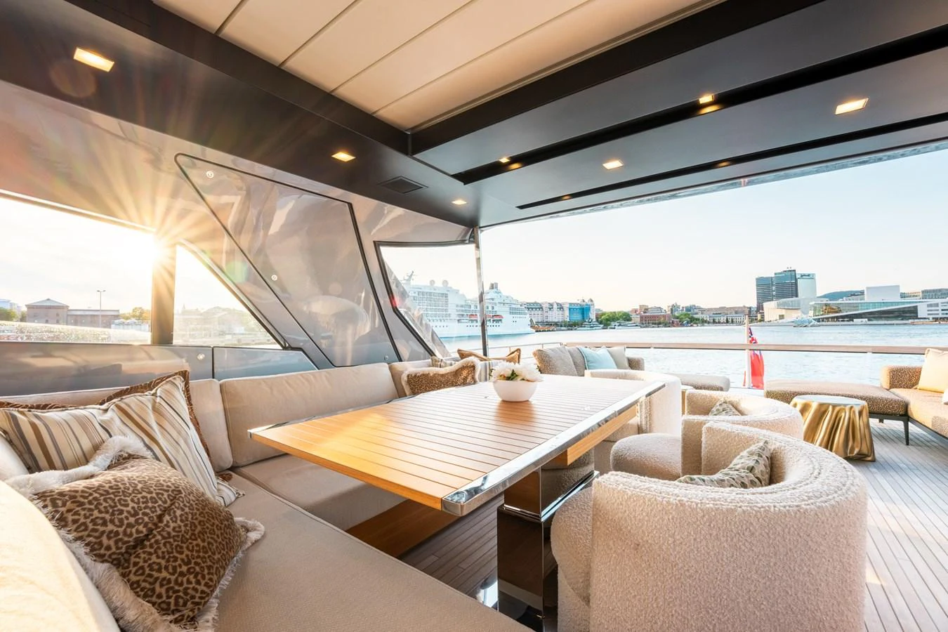 a room with a table and chairs aboard NORTH Yacht for Sale