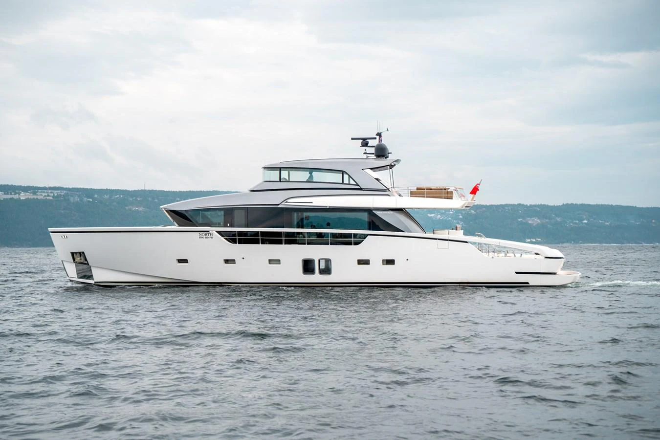 a white yacht in the water aboard NORTH Yacht for Sale