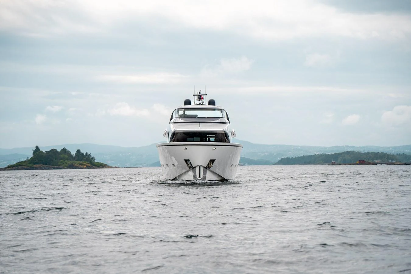 a white boat in the water aboard NORTH Yacht for Sale