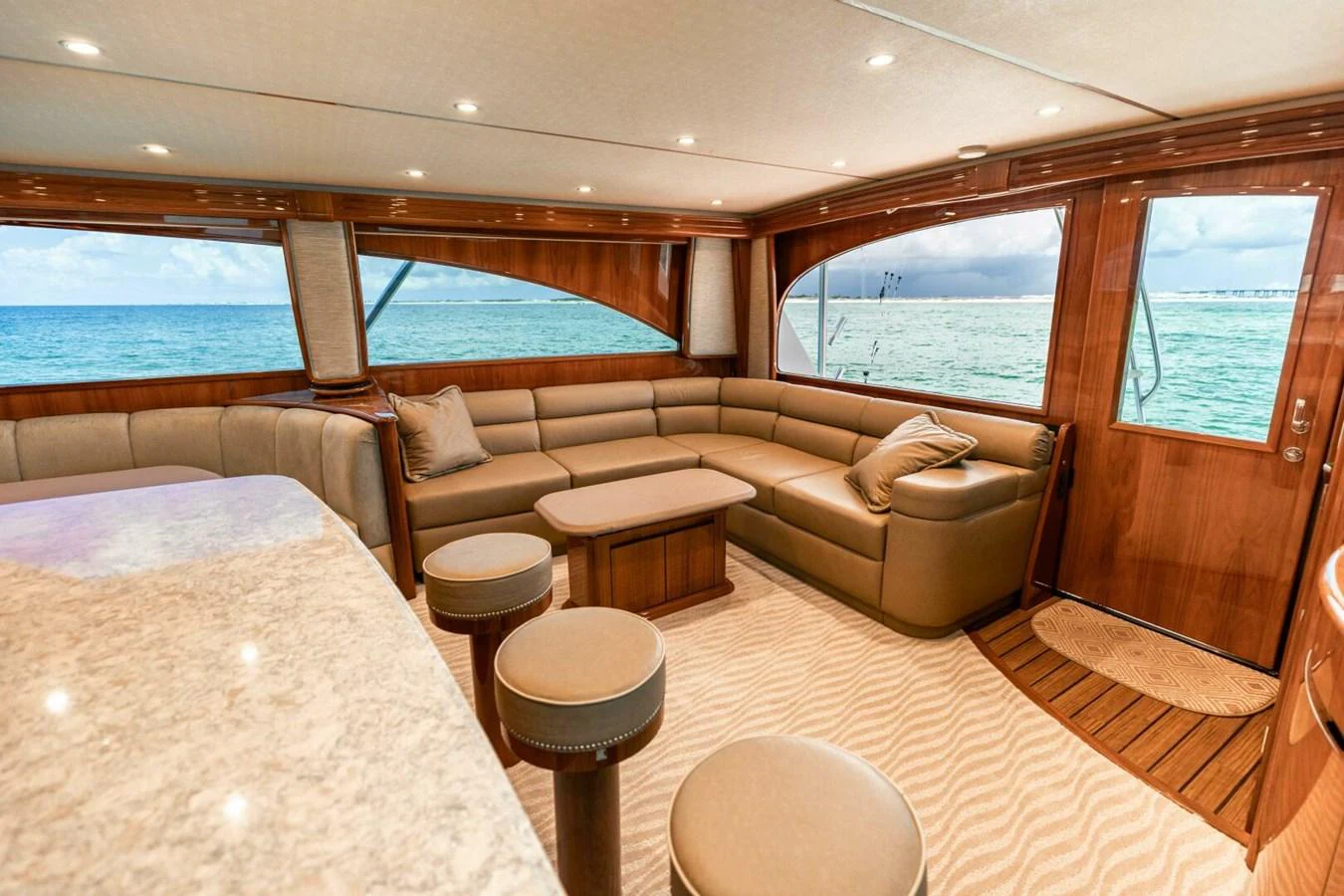 a large living room with a large window aboard MISS VIRGINIA Yacht for Sale