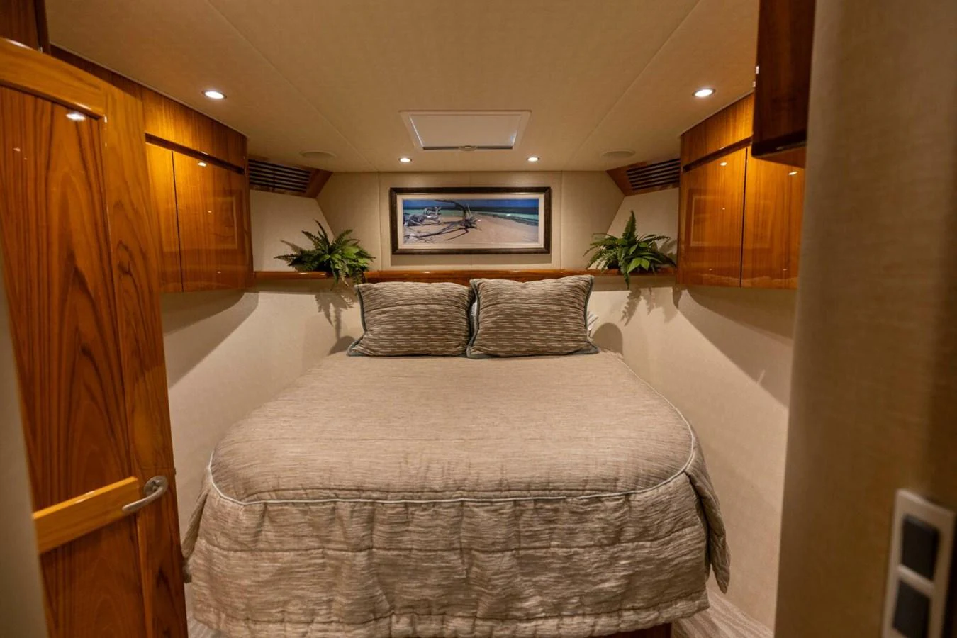 a bed in a room aboard MISS VIRGINIA Yacht for Sale