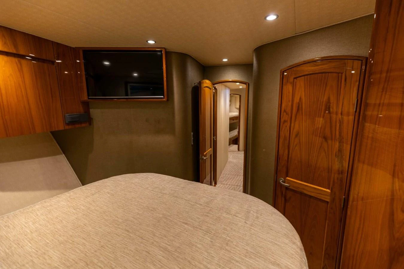a bed in a room aboard MISS VIRGINIA Yacht for Sale