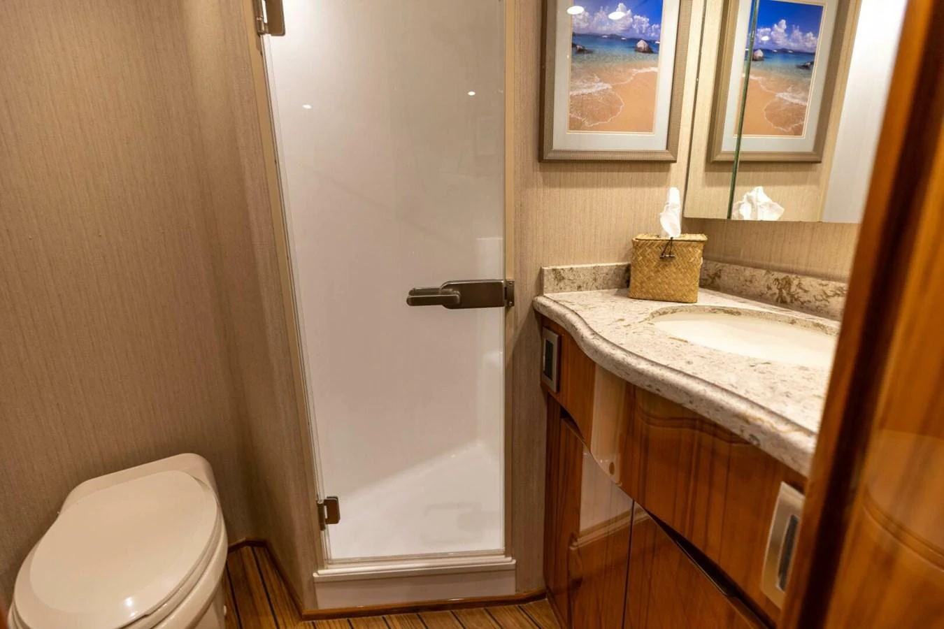 a bathroom with a sink and toilet aboard MISS VIRGINIA Yacht for Sale