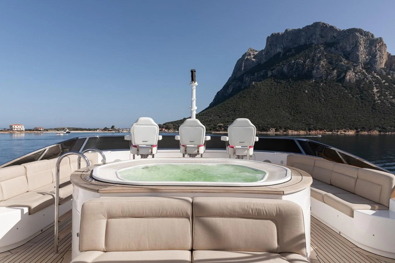 The sundeck features a luxurious jacuzzi with stunning views of the surrounding landscape. aboard VIRTUE Yacht for Sale