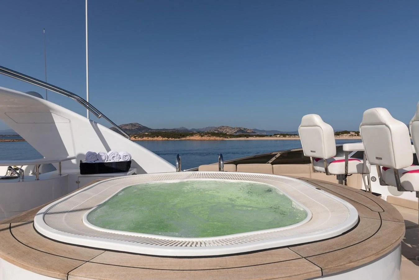 The sundeck features a luxurious jacuzzi with stunning views of the surrounding waters. aboard VIRTUE Yacht for Sale