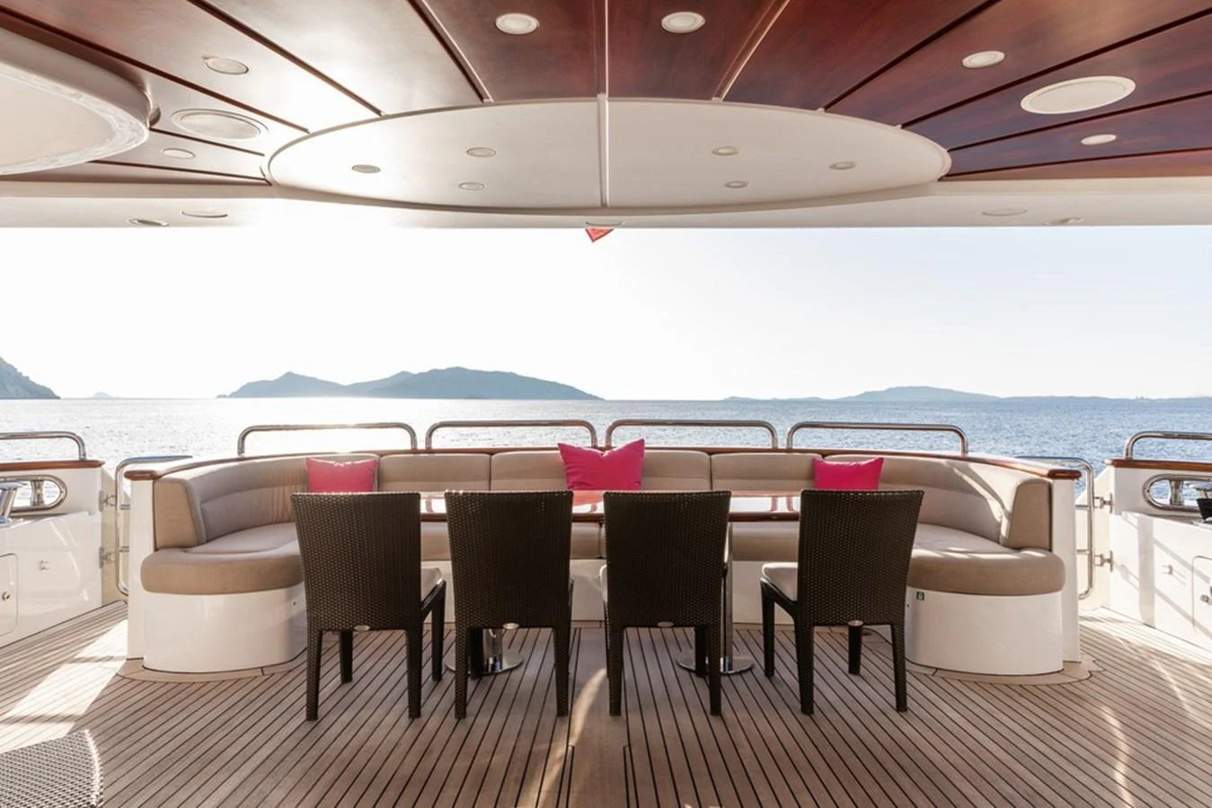 The aft deck features a spacious seating area with a stunning view of the sea. aboard VIRTUE Yacht for Sale