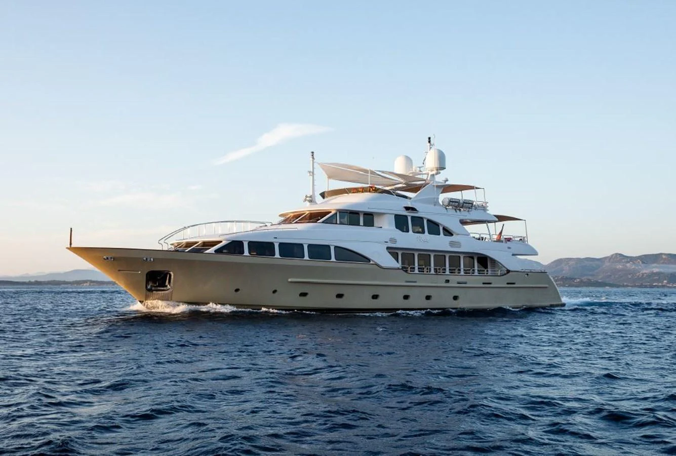 A luxurious yacht cruises gracefully on the open water, showcasing its elegant design and spacious decks. aboard VIRTUE Yacht for Sale