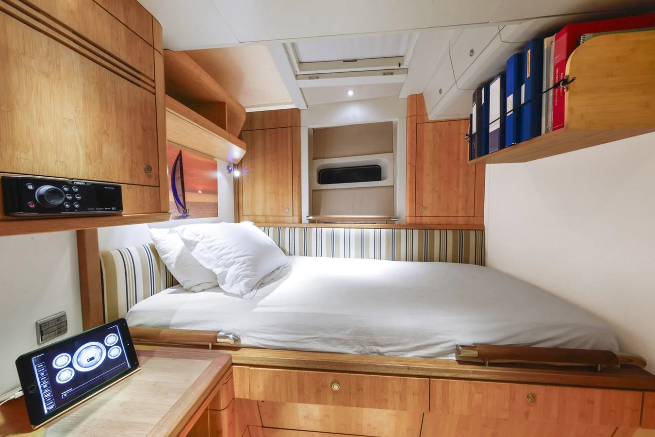 a bed in a room aboard CAPRICORNO Yacht for Sale