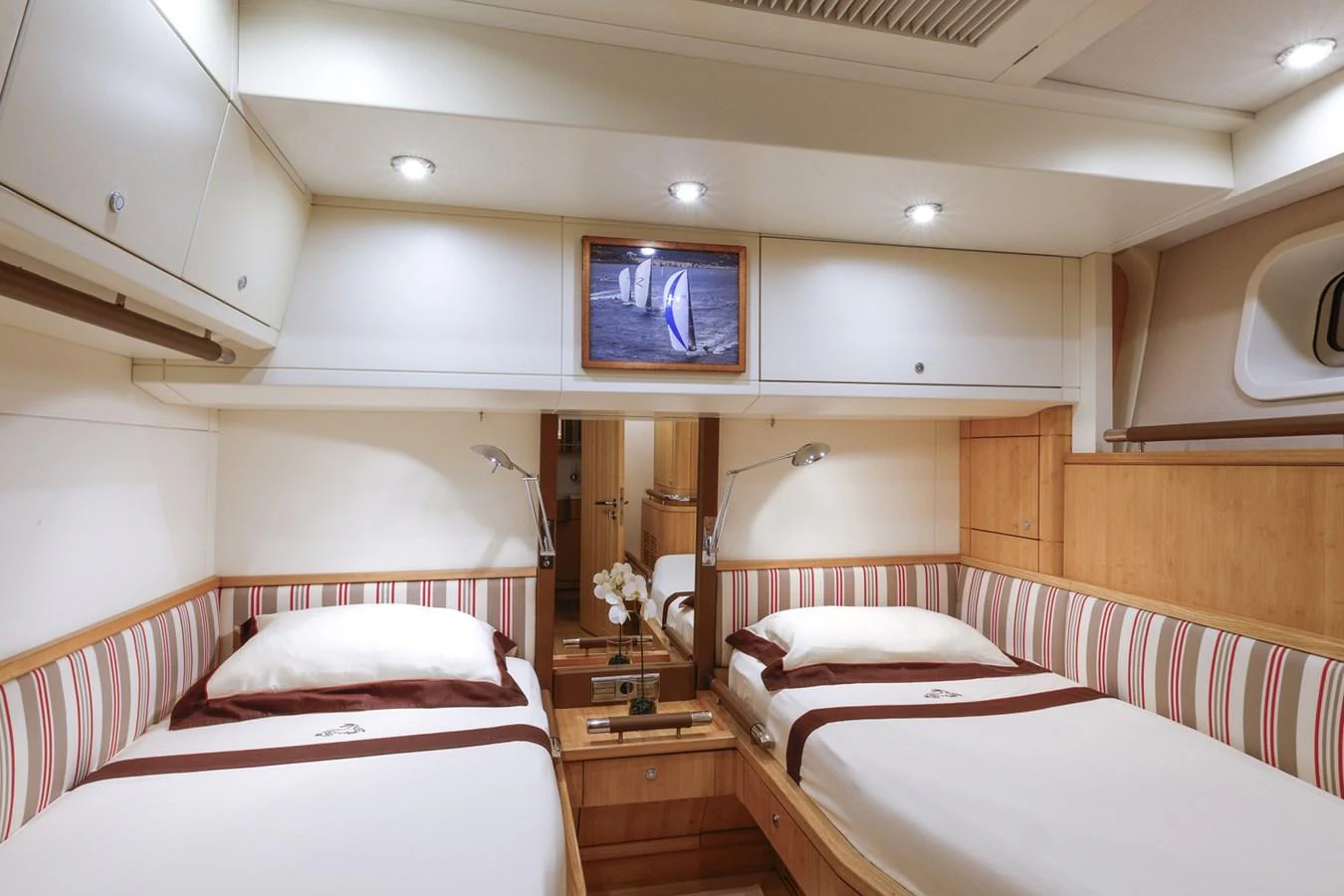 a room with two beds aboard CAPRICORNO Yacht for Sale