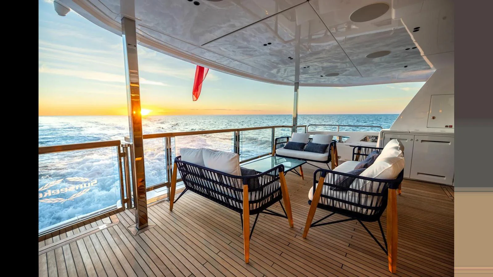 a deck with chairs and a table aboard 100 YACHT Yacht for Sale