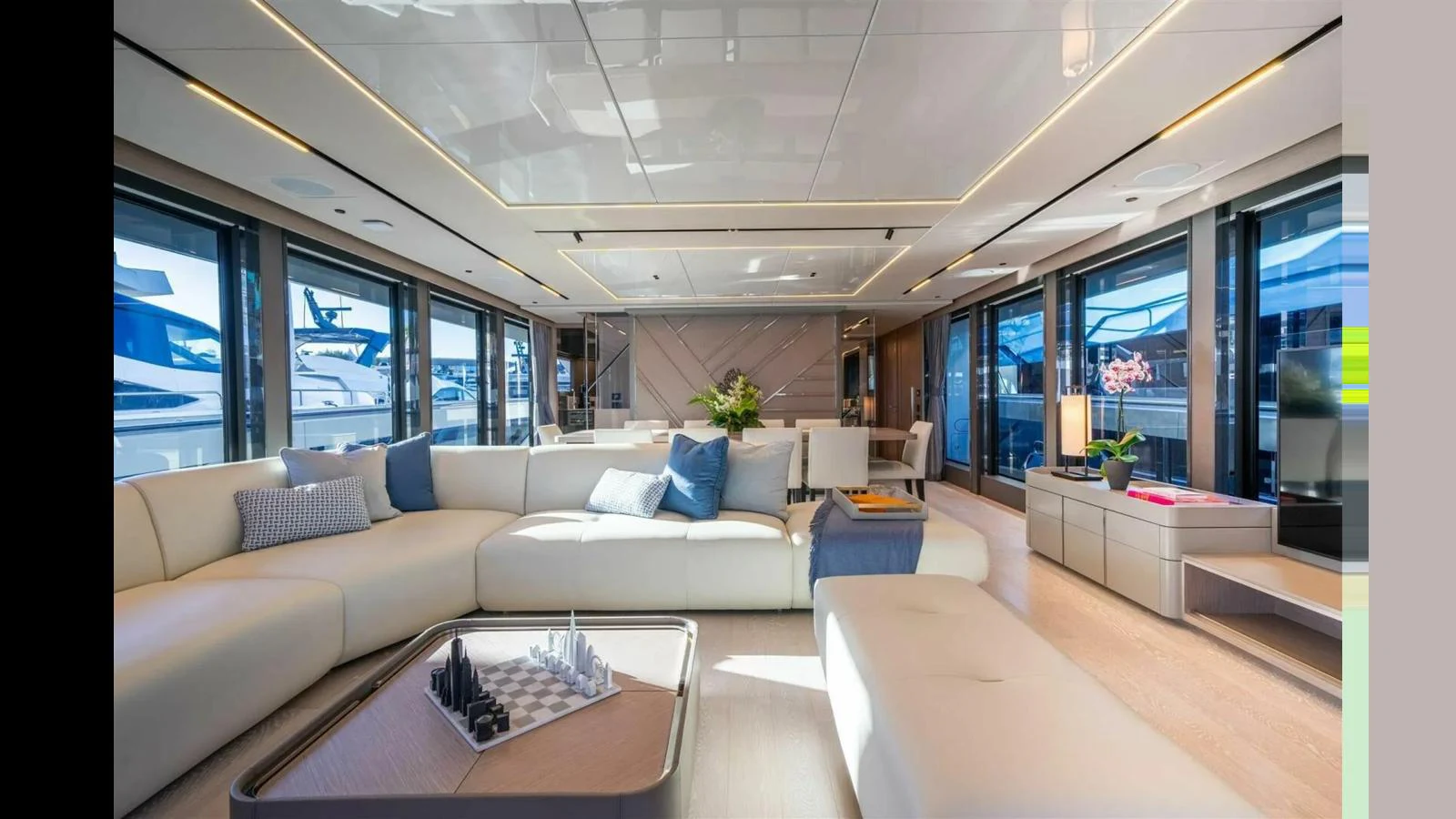 a living room with a large window aboard 100 YACHT Yacht for Sale