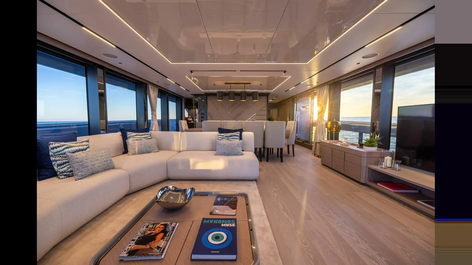 a living room with a large window aboard 100 YACHT Yacht for Sale