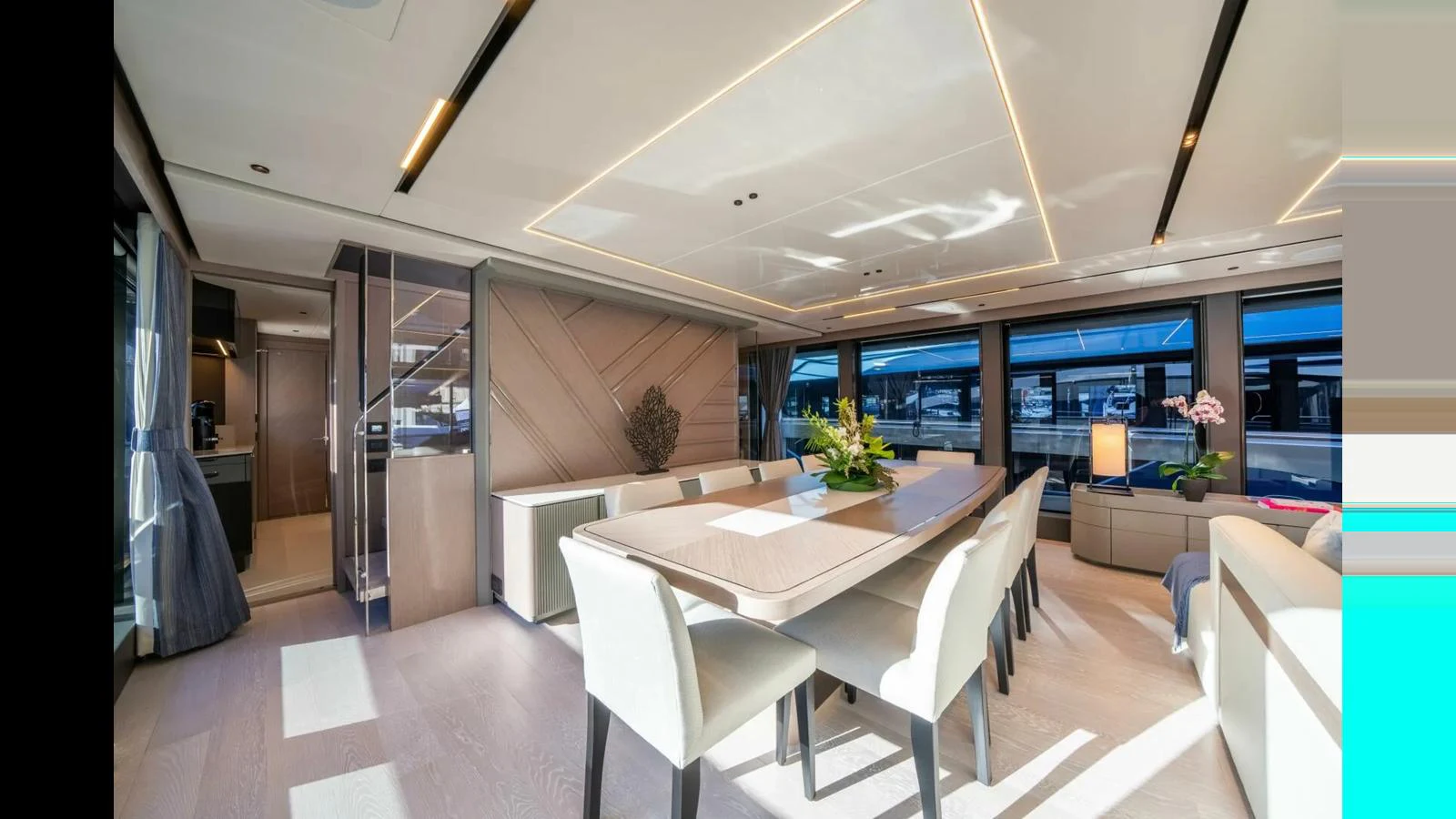 a room with a table and chairs aboard 100 YACHT Yacht for Sale