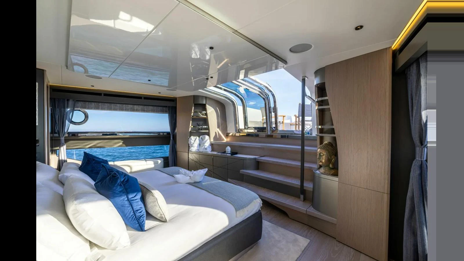 a room with a bed and a window aboard 100 YACHT Yacht for Sale