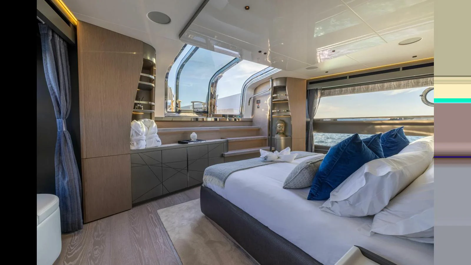 a room with a bed and a window aboard 100 YACHT Yacht for Sale
