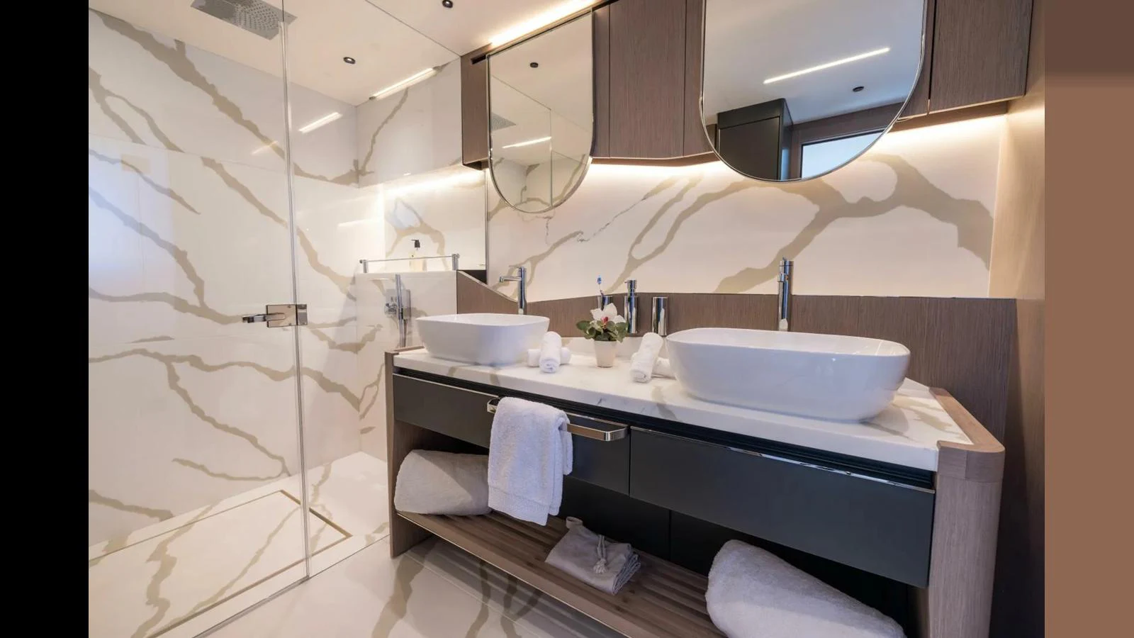 a bathroom with a sink and a shower aboard 100 YACHT Yacht for Sale