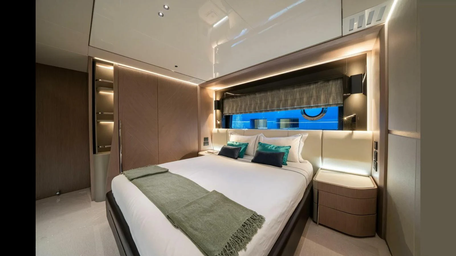 a room with a bed and a desk aboard 100 YACHT Yacht for Sale