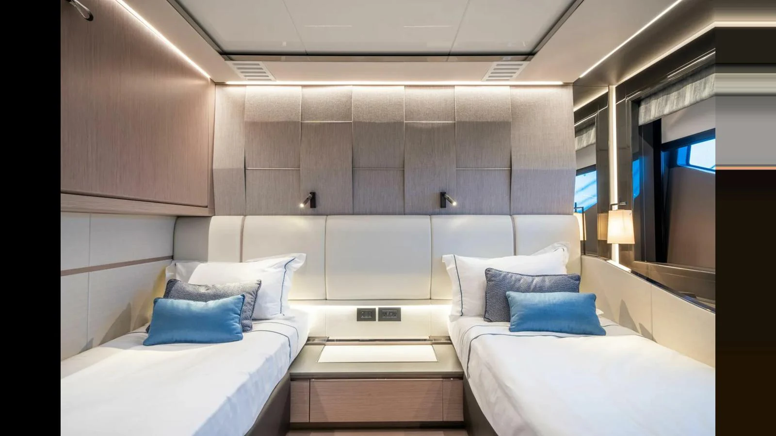 a room with a bed and a tv aboard 100 YACHT Yacht for Sale