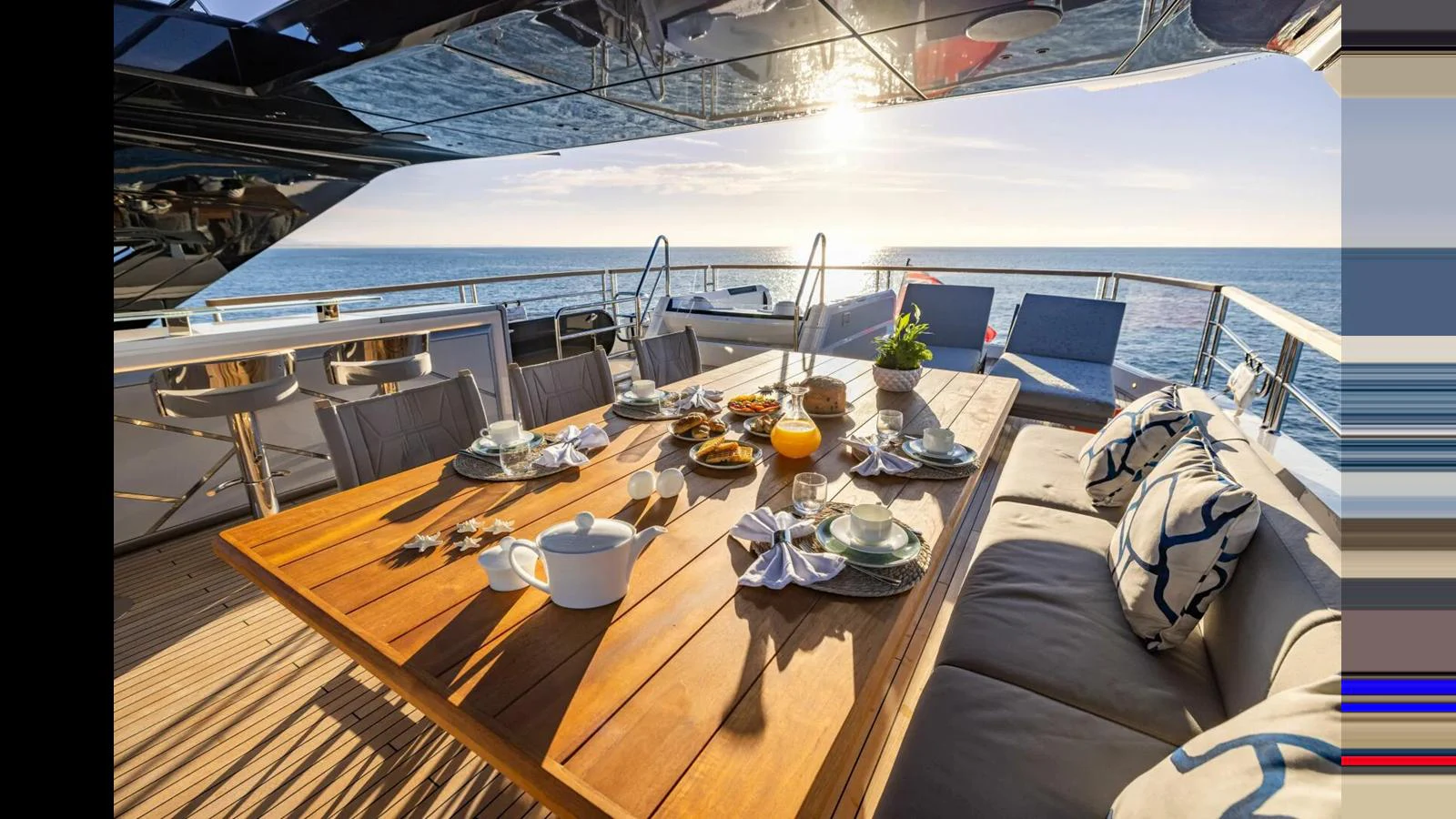 a table with food on it aboard 100 YACHT Yacht for Sale