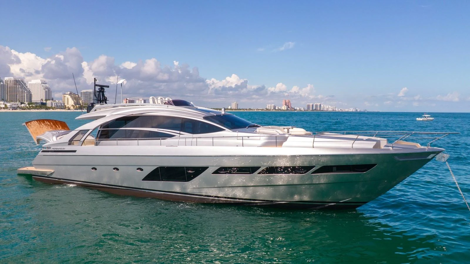 a white yacht in the water aboard ALEXANDRA Yacht for Sale