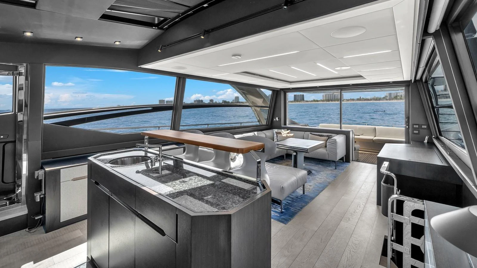 a room with a table and chairs aboard ALEXANDRA Yacht for Sale