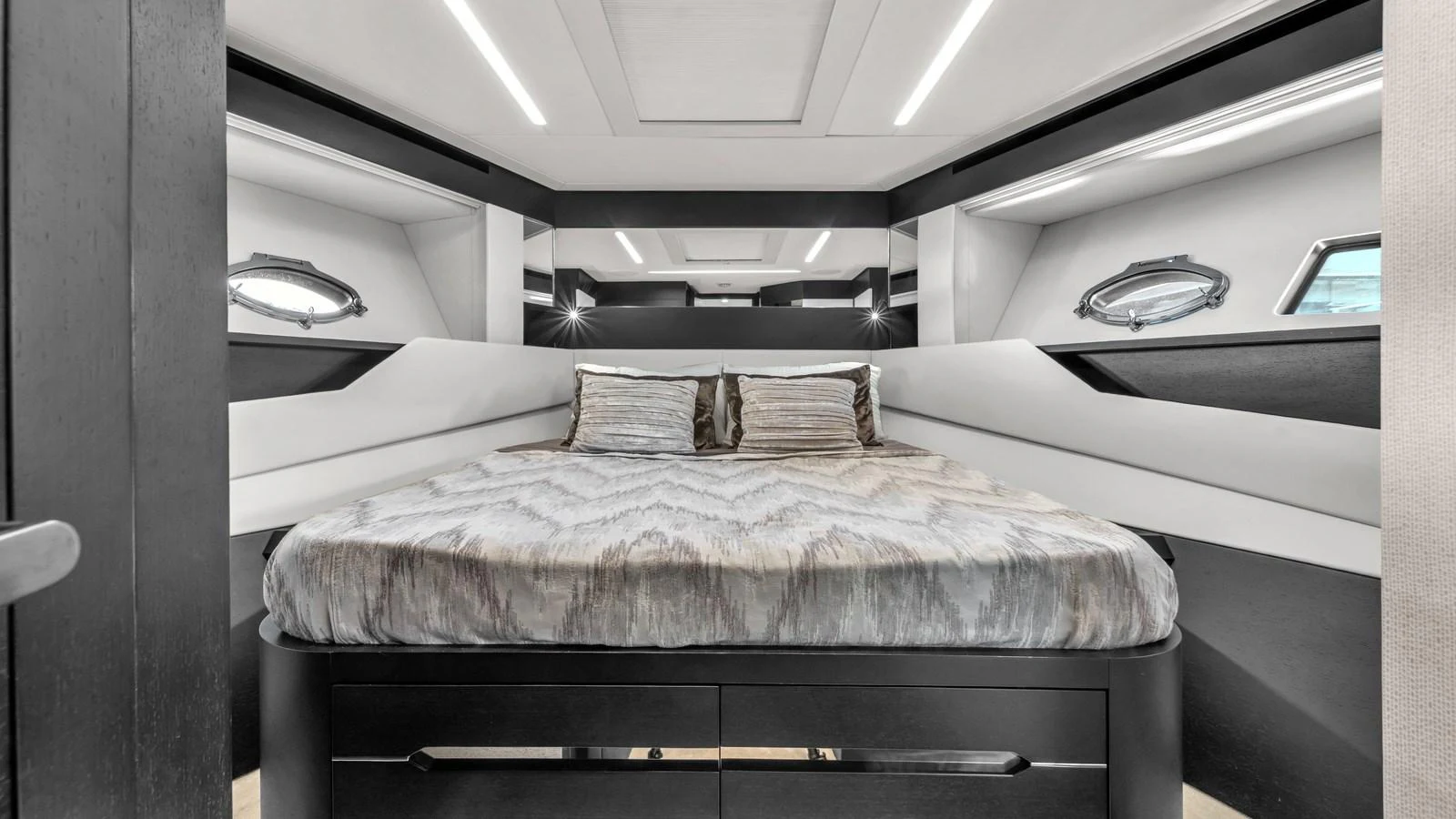 a room with a bed and a window aboard ALEXANDRA Yacht for Sale
