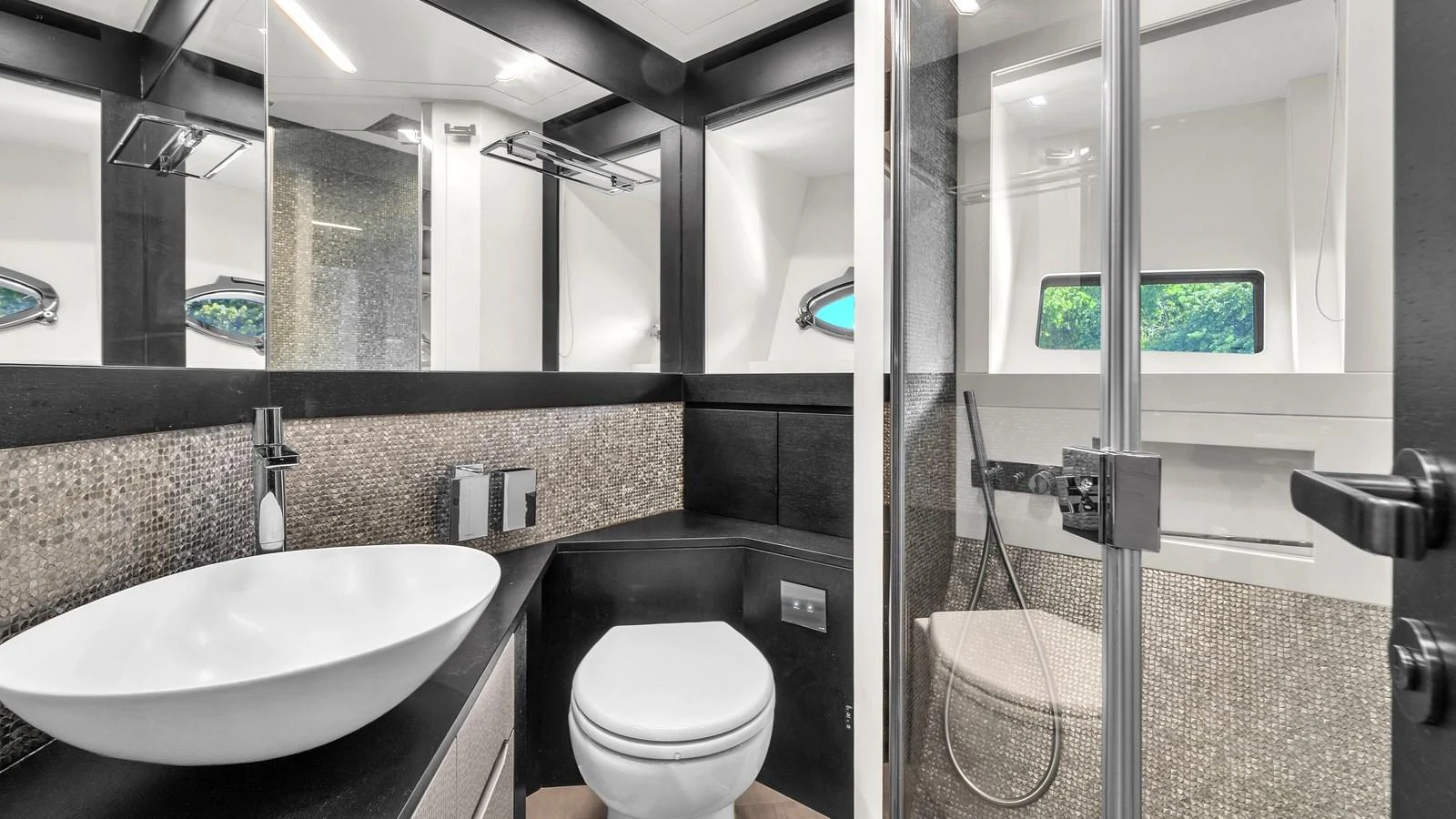 a bathroom with a sink toilet and a shower unit aboard ALEXANDRA Yacht for Sale