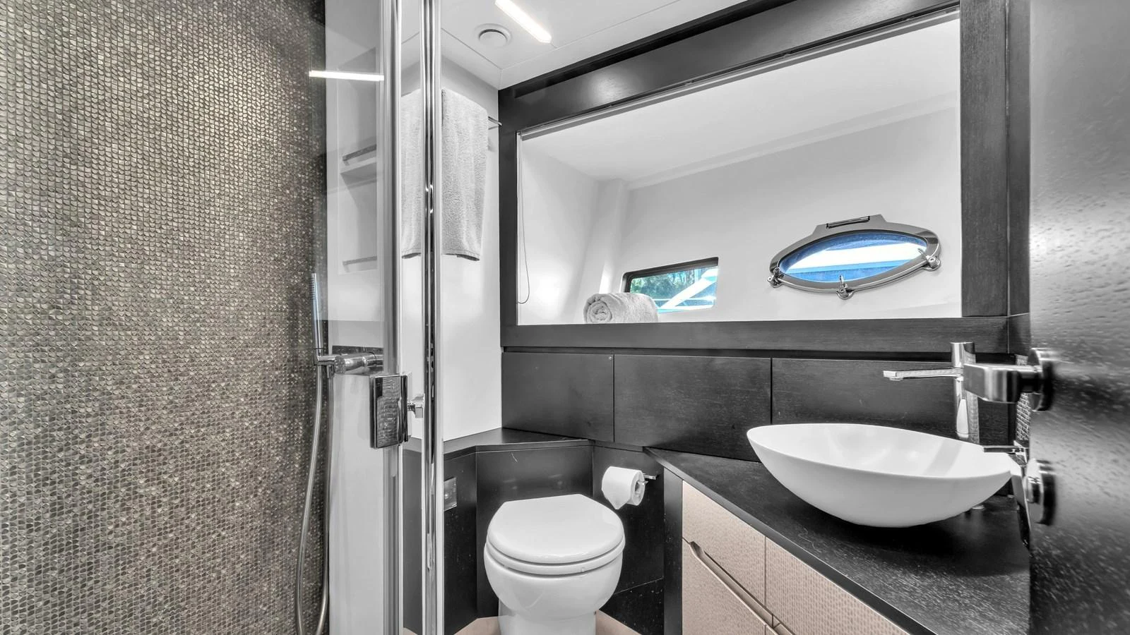 a bathroom with a sink and a toilet aboard ALEXANDRA Yacht for Sale