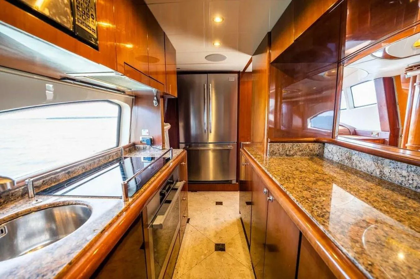a kitchen with a large island aboard AZURE Yacht for Sale