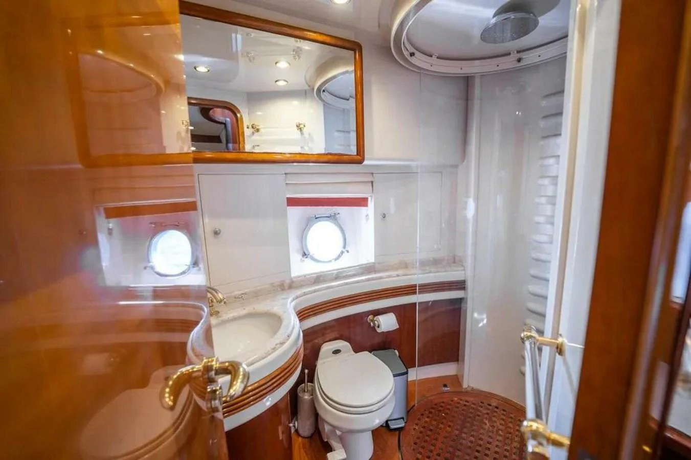a bathroom with a toilet and sink aboard AZURE Yacht for Sale