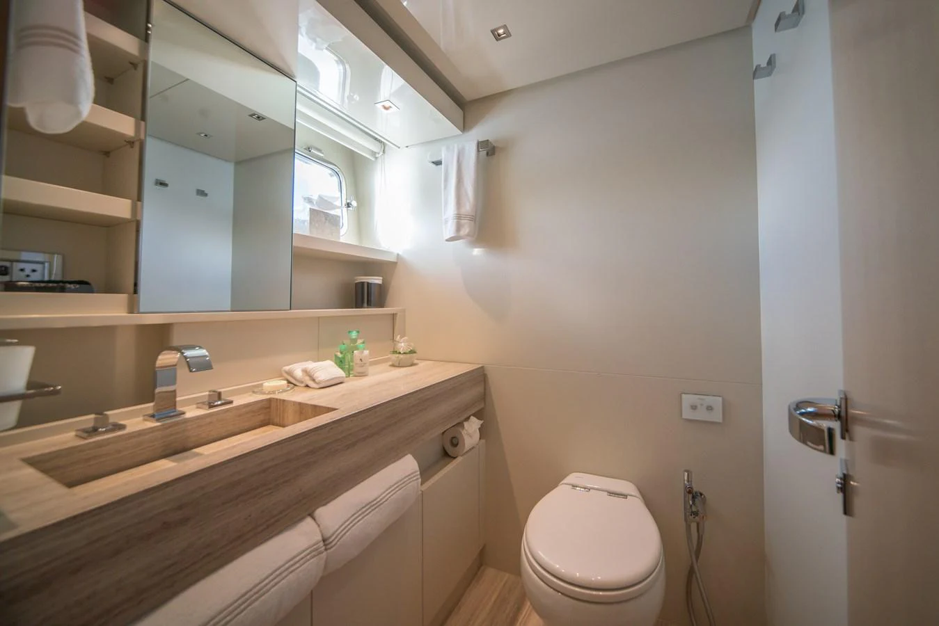 The yacht's bathroom features modern fixtures and a sleek design, providing a comfortable and stylish space. aboard AKULA Yacht for Sale