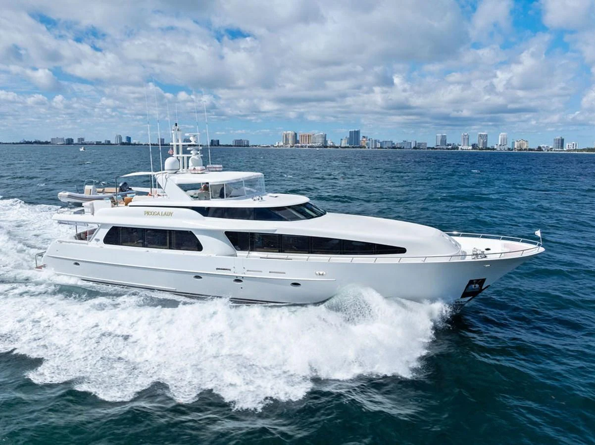 a white yacht on the water aboard PICOSA LADY Yacht for Sale