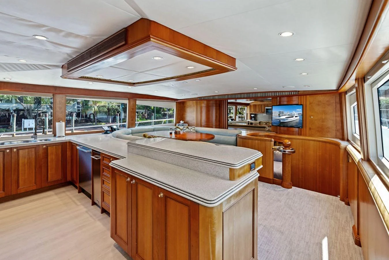 a large kitchen with wooden cabinets aboard PICOSA LADY Yacht for Sale