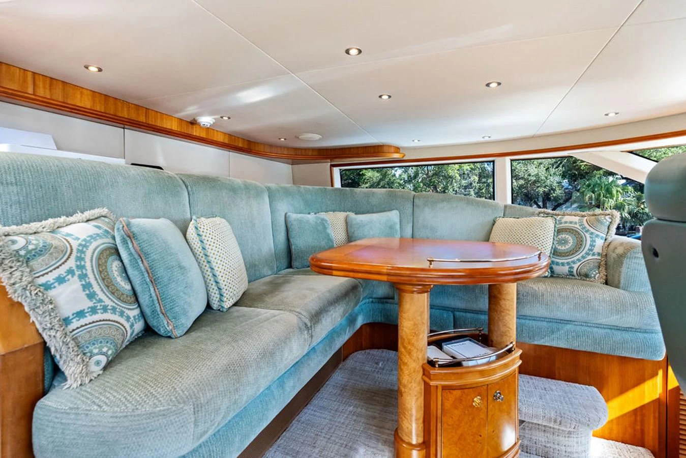 a living room with a couch and a table aboard PICOSA LADY Yacht for Sale